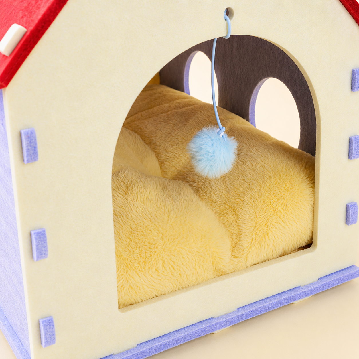 Red House Cat Cave interior cushion and dangle toy