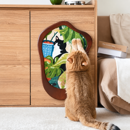 Cats & Plants Art Print Cat Scratcher leaning against wood cabinet with orange cat scratching