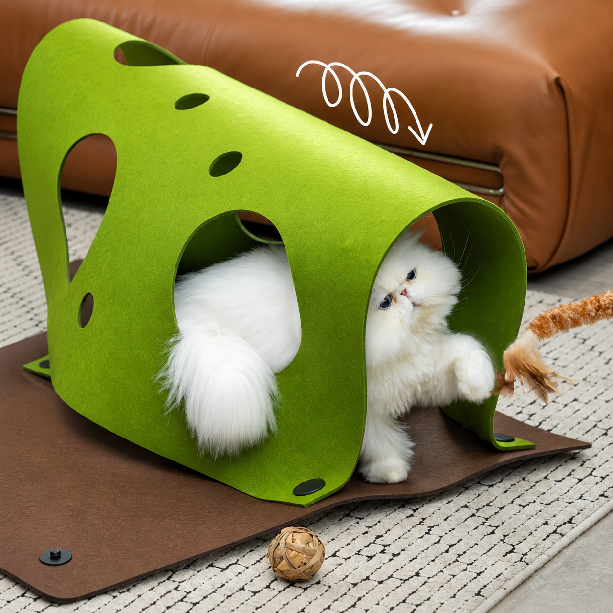 White cat playing inside the green Felt Play Mat