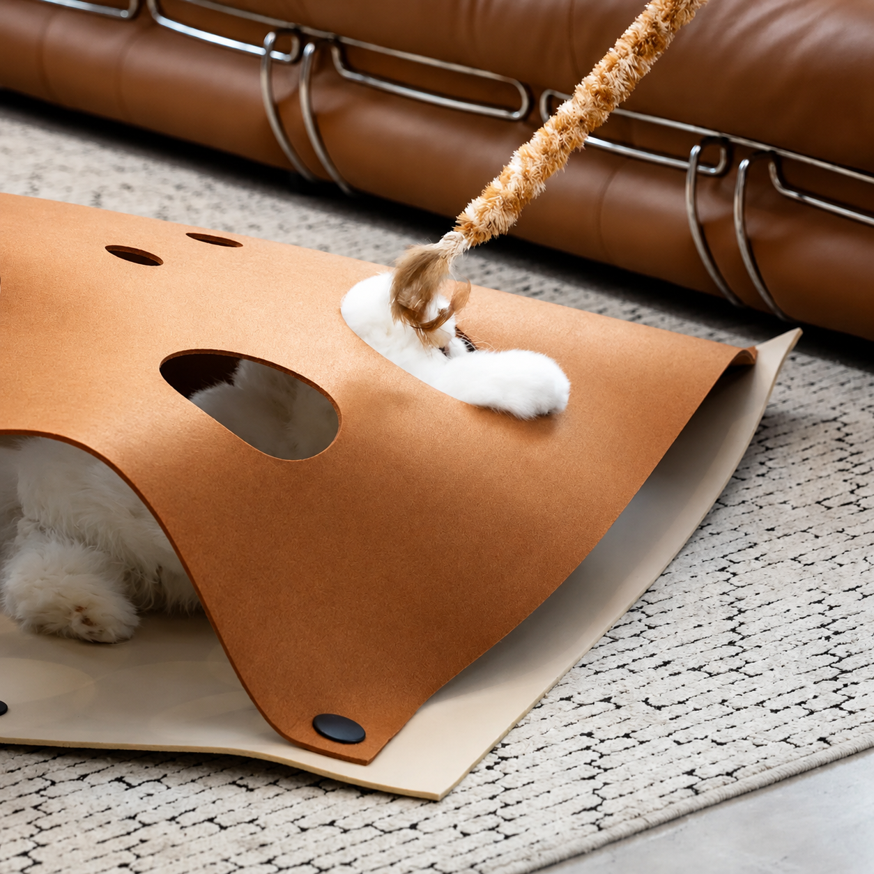 Cat paw reaching through the caramel Felt Play Mat