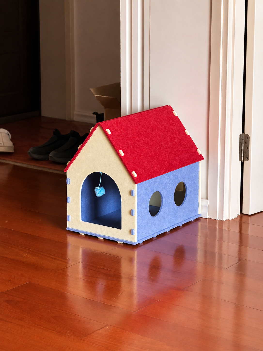 Red House Cat Cave placed in a real home entryway